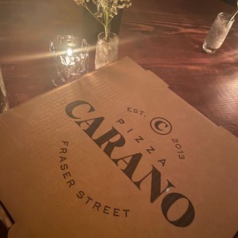 Pizza Carano - a box of pizza on a table - Pizza Near Me - Vancouver, British Columbia