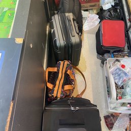 Luggage storage space behind counter
