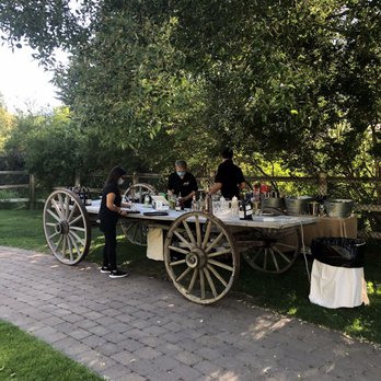 Trail Creek Cabin - a table set up under a tree - American Near Me - Sun Valley, Idaho Trail Creek Cabin - a table set up under a tree - American Near Me - Sun Valley, Idaho