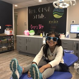 Ready and EXCITED for her check-up to get started. (Sunglasses provided for comfort from the bright light + she was able to keep them) Ready and EXCITED for her check-up to get started. (Sunglasses provided for comfort from the bright light + she was able to keep them)