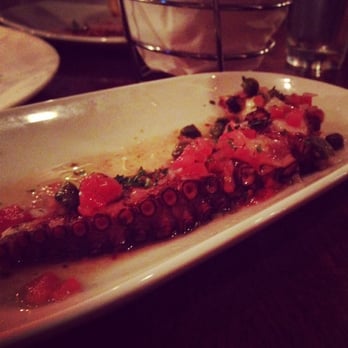 Agora DC - Grilled octopus with capers and tomatoes. - Mediterranean Near Me - Washington, DC, District of Columbia Agora DC - Grilled octopus with capers and tomatoes. - Mediterranean Near Me - Washington, DC, District of Columbia
