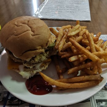 Laughing Larry's Lunch Room - Pork loin sandwich with fries on a placemat of truck classifieds - American Near Me - Tomah, Wisconsin Laughing Larry's Lunch Room - Pork loin sandwich with fries on a placemat of truck classifieds - American Near Me - Tomah, Wisconsin