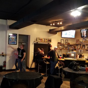 Cue & Brews - a group of people at a bar - Pool Halls Near Me - Pocatello, Idaho