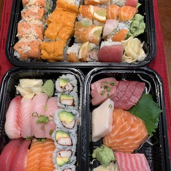 Mori Sushi - Takeout All Inclusive Combo - 4 rolls on top, bottom left = sushi plate, bottom right = sashimi plate - Japanese Near Me - Skillman, New Jersey