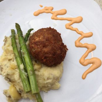 Mallards At The Wharf - Crab cake. Little filler on top of wonderful mashed potatoes! - American Near Me - Onancock, Virginia Mallards At The Wharf - Crab cake. Little filler on top of wonderful mashed potatoes! - American Near Me - Onancock, Virginia
