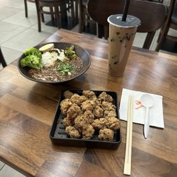 Taiwanese braised pork rice bowl, popcorn chicken, Hong Kong-style milk tea with grass jelly Taiwanese braised pork rice bowl, popcorn chicken, Hong Kong-style milk tea with grass jelly