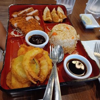 Sushi Hana - Pork Katsu Bento with fried dumplings, veggie fried rice, and veggie Tempura, $15.95. - Japanese Near Me - Richmond, Texas Sushi Hana - Pork Katsu Bento with fried dumplings, veggie fried rice, and veggie Tempura, $15.95. - Japanese Near Me - Richmond, Texas