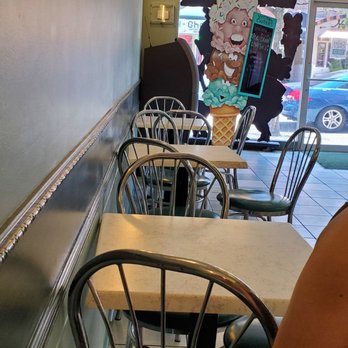 Ice Cream Charlies - Sitting area. You could see the ATM, in the background. - Desserts Near Me - Rutherford, New Jersey