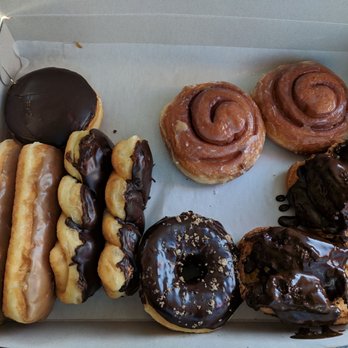 Lady's Donuts - pictures 2 maple bars 2 chocolate twists 2 fresh glazed buttermilk one chocolate raised with cinnamon sprikle 2 mini glazed cinnamon buns - Bakeries Near Me - Glendora, California