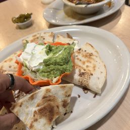 Quesadillas de pollito and a small menudo. Quesadillas de pollito and a small menudo.