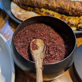 Yalda - Atlanta - Jar of sumac spice served with our kabobs. Yum. - Middle Eastern Near Me - Atlanta, Georgia