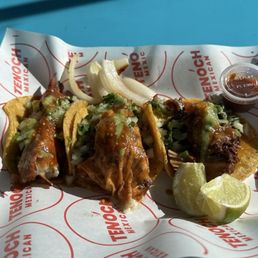 Tacos: Chorizo w/ melted cheese, steak w/ melted cheese, carnitas & chorizo (left to right)