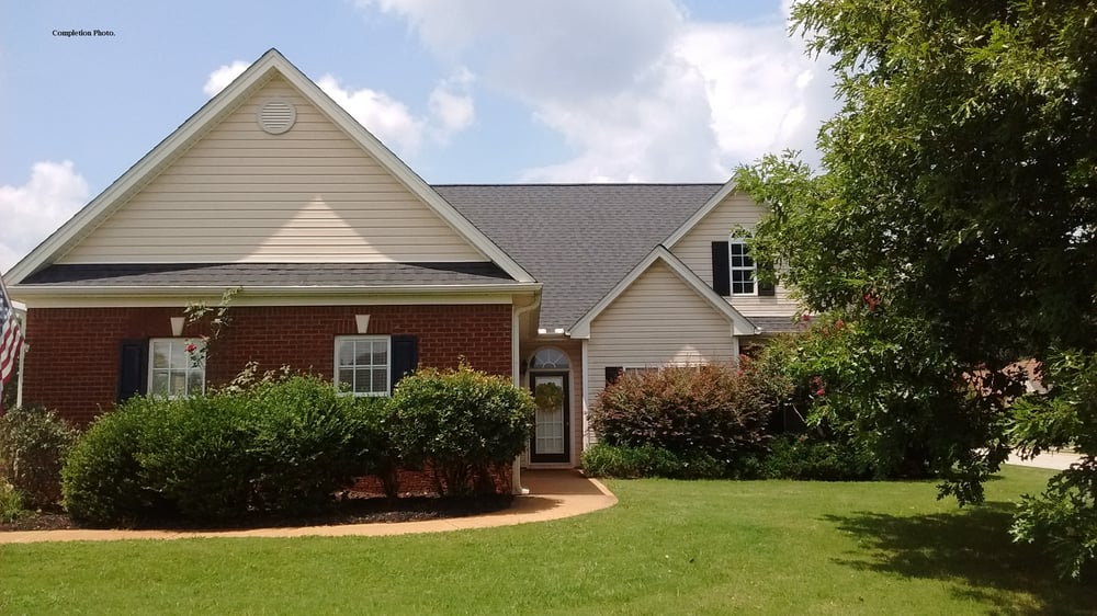 Slide of Accurate Roofing Pros