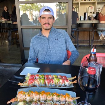 Rock-n-Sake Bar & Sushi - My boyfriend and I enjoying dinner on the patio - Sushi Bars Near Me - Lafayette, Louisiana