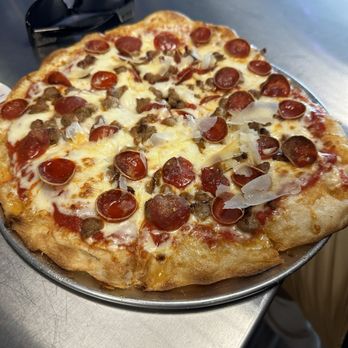 Cosmic Bottles - Pepperoni and Sausage Pizza - Beer Bar Near Me - Covington, Washington