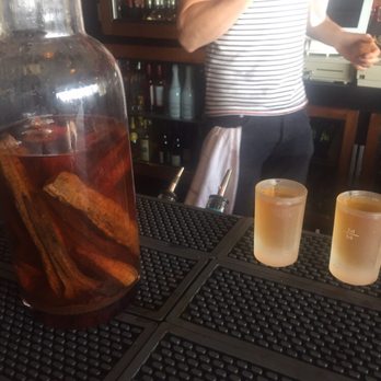 La Movida Tapas - This is the "shot all the locals take". That's banana in the bottle - Bars Near Me - Nice, 06