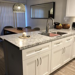 Khoi and his team knocked out this useless wall to give us real breathing room. The quartz countertop is beautiful as well. Khoi and his team knocked out this useless wall to give us real breathing room. The quartz countertop is beautiful as well.