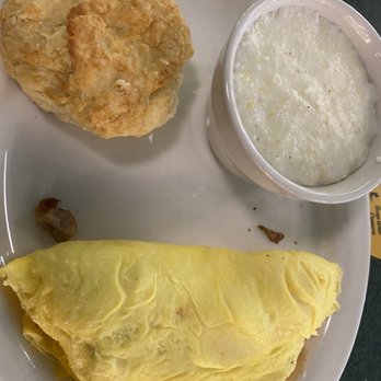 Metro Diner - Meat lovers omelette with biscuit and grits - Diners Near Me - Melbourne, Florida Metro Diner - Meat lovers omelette with biscuit and grits - Diners Near Me - Melbourne, Florida