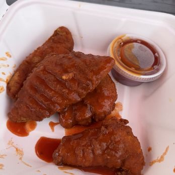 Algonquin Lunch Bar & Gas Station - Buffalo sauced chicken fingers with side of barbecue sauce - Gas Stations Near Me - Whitney, Ontario Algonquin Lunch Bar & Gas Station - Buffalo sauced chicken fingers with side of barbecue sauce - Gas Stations Near Me - Whitney, Ontario
