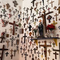 Casa Ofelia - Their collection of crosses.