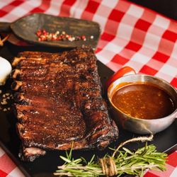 Georgia Boys BBQ - Longmont - Seasoned and sauced, our St. Louis style slow smoked pork ribs will have you coming back for more!