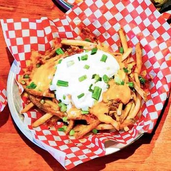Chuck's Roadhouse Bar & Grill - a plate of loaded fries - Bars Near Me - Cambridge, Ontario Chuck's Roadhouse Bar & Grill - a plate of loaded fries - Bars Near Me - Cambridge, Ontario