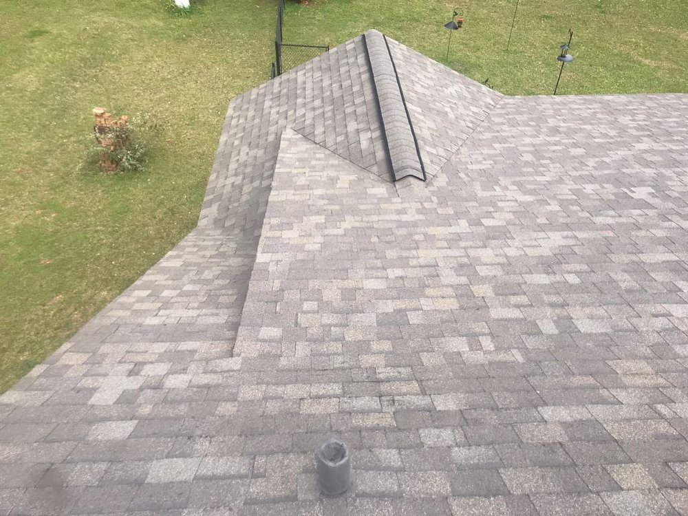 Slide of Tadlock Roofing