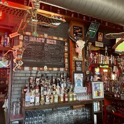 Red Door Saloon - Cool bar vibe! Love the " Dia De Los Muertos" motif!
