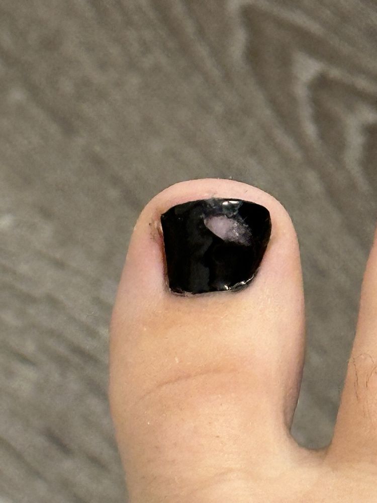 Vanity Nails & Spa Logo