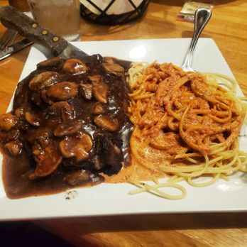 Caffe Amici - Ribeye with a mushroom gravy sauce. Not that good. It had a lot of char flavor. Undercooked too but I like rare so I kept it. - Italian Near Me - Columbus, Georgia Caffe Amici - Ribeye with a mushroom gravy sauce. Not that good. It had a lot of char flavor. Undercooked too but I like rare so I kept it. - Italian Near Me - Columbus, Georgia