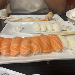 Mountain of rice with slither of salmon Salmon nigiri Mountain of rice with slither of salmon Salmon nigiri