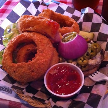 Huey's Downtown - California burger buried by delicious onion rings! Note: I added jalapeño, doesn't come with normally. - Burgers Near Me - Memphis, Tennessee Huey's Downtown - California burger buried by delicious onion rings! Note: I added jalapeño, doesn't come with normally. - Burgers Near Me - Memphis, Tennessee
