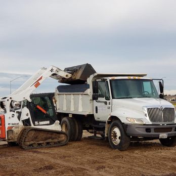 California Landscape Services - a white dump truck with a crane - Landscaping Near Me - Manteca, California California Landscape Services - a white dump truck with a crane - Landscaping Near Me - Manteca, California