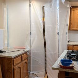 Big Dog Restoration - Small containment, but a great job with negative air pressure for keeping the house usable