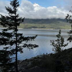Halcyon Hot Springs - Arrow Lake with Mt Burnham peeking out from above the clouds.