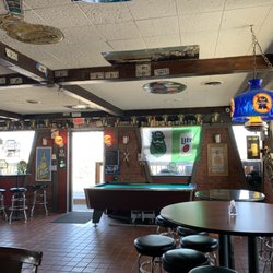 TNT's Tavern - Looking out front, there is corn hole outside on the deck