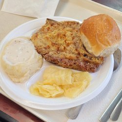 Moon's Fried Chicken & Cafeteria - Baked pork chop, mashed and gravy, cabbage, and a roll.