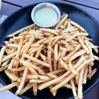 RoofTop at the Exchange Place - very food fries with delicious green dipping sauce - New American Near Me - Jersey City, New Jersey RoofTop at the Exchange Place - very food fries with delicious green dipping sauce - New American Near Me - Jersey City, New Jersey