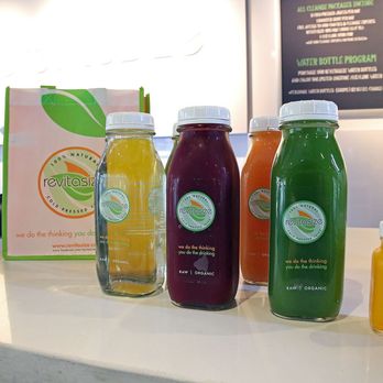 Revitasize - a variety of juices on a counter - Juice Bars & Smoothies Near Me - Toronto, Ontario Revitasize - a variety of juices on a counter - Juice Bars & Smoothies Near Me - Toronto, Ontario
