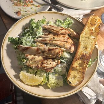 Moxies - Ceasar salad with grilled chicken - New American Near Me - Boston, Massachusetts Moxies - Ceasar salad with grilled chicken - New American Near Me - Boston, Massachusetts