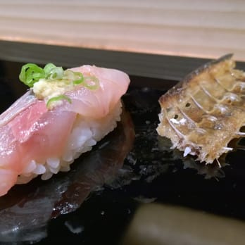 Wataru - Spanish Mackerel with green onion and ginger, deep fried fish bone - Sushi Bars Near Me - Seattle, Washington Wataru - Spanish Mackerel with green onion and ginger, deep fried fish bone - Sushi Bars Near Me - Seattle, Washington