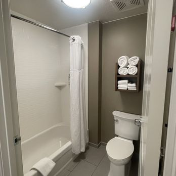 Staybridge Suites St George - Dirty Hand Towel hanging from shower curtain - Hotels Near Me - Saint George, Utah Staybridge Suites St George - Dirty Hand Towel hanging from shower curtain - Hotels Near Me - Saint George, Utah
