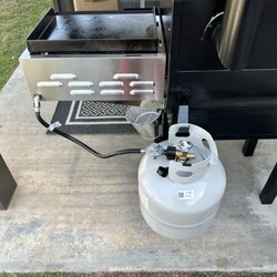 Camp Chef - Propane tank for the sidekick burner/griddle comes with a hanger for the tank...Now he can feed his 80 kids with bbq!! LOLOL!!