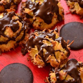 Sweet Beginnings - Ambrosia Macaroons Golden carmelized coconut goodness drizzled w/ dark bittersweet chocolate - Desserts Near Me Sweet Beginnings - Ambrosia Macaroons Golden carmelized coconut goodness drizzled w/ dark bittersweet chocolate - Desserts Near Me