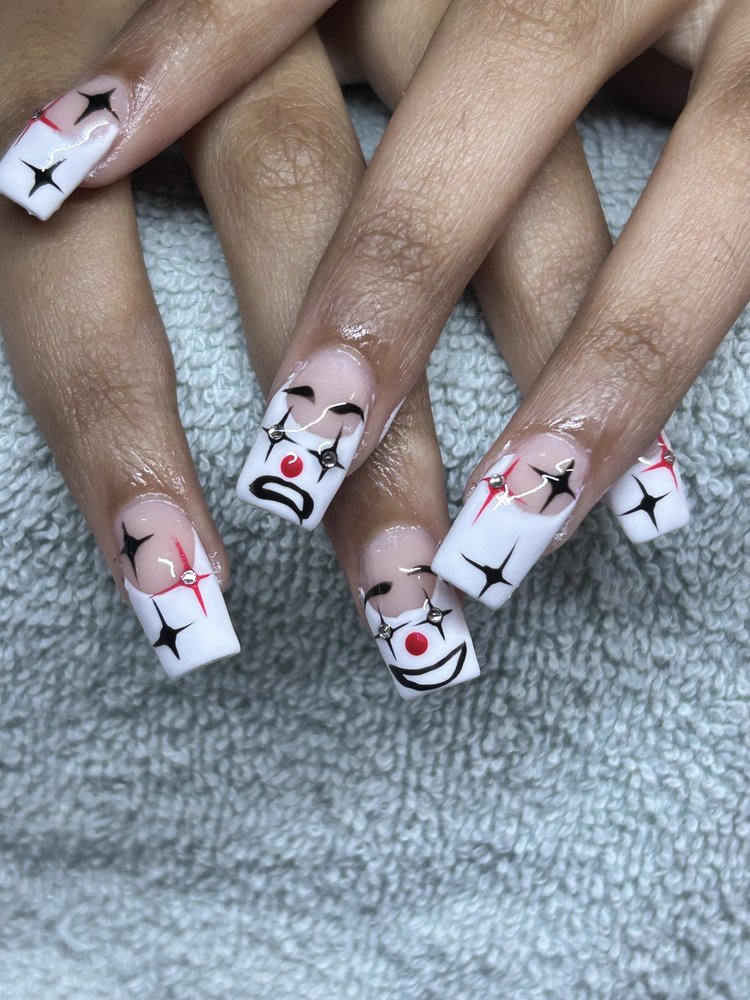 Nailed by Shell Logo
