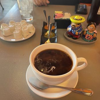 Mexico Lindo Restaurants - Table offerings. The little salt and paper shakers were adorable. - Mexican Near Me - San Antonio, Texas