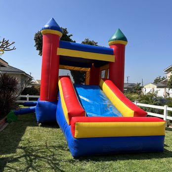 Olivia's backyard playhouse - Combo Slide Jumper - Party Supplies Near Me