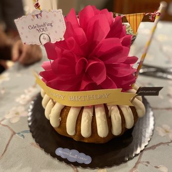 Nothing Bundt Cakes - a bundt cake with a flower on top - Bakeries Near Me - San Diego, California