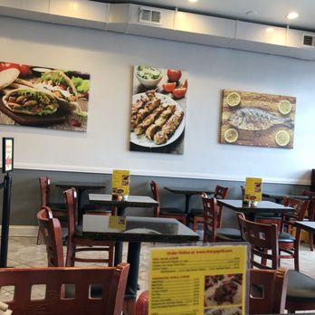 Charga - Inside - lots of 2 tops, three 4 stops can and some stool seating against the window - American Near Me - Arlington, Virginia Charga - Inside - lots of 2 tops, three 4 stops can and some stool seating against the window - American Near Me - Arlington, Virginia