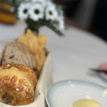 Le Pavillon - Breads- spicy lavash, sourdough, cheese roll - French Near Me - New York, New York Le Pavillon - Breads- spicy lavash, sourdough, cheese roll - French Near Me - New York, New York